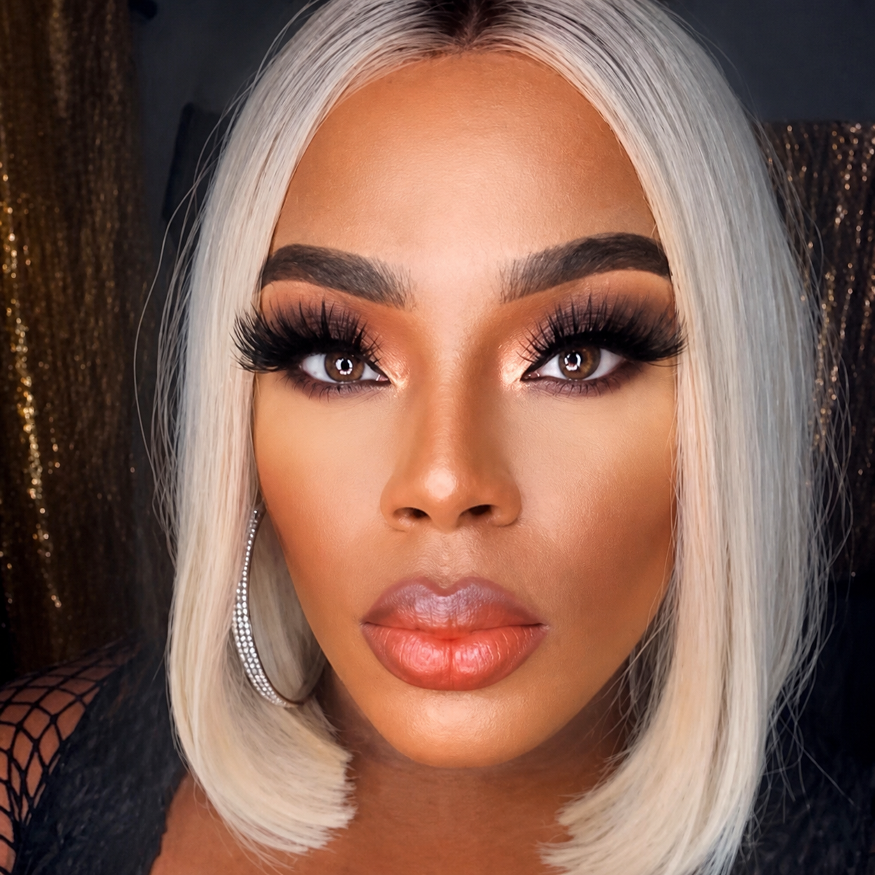 Enhanced crop from the public X profile photograph of Karmen Tsunami.